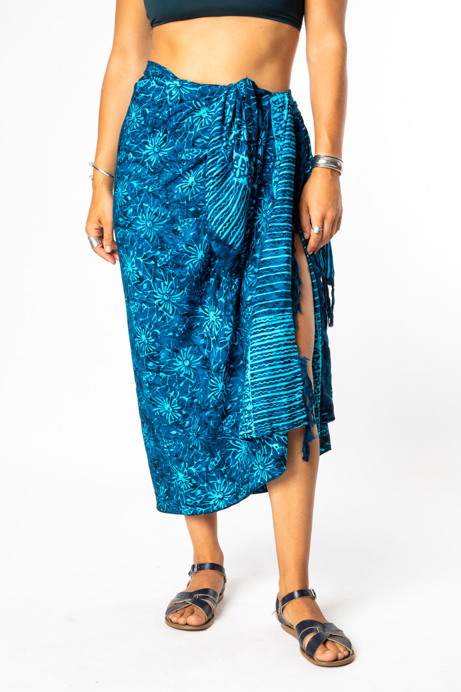 Sophie is wearing a batik sarong in blue tripping daisies 