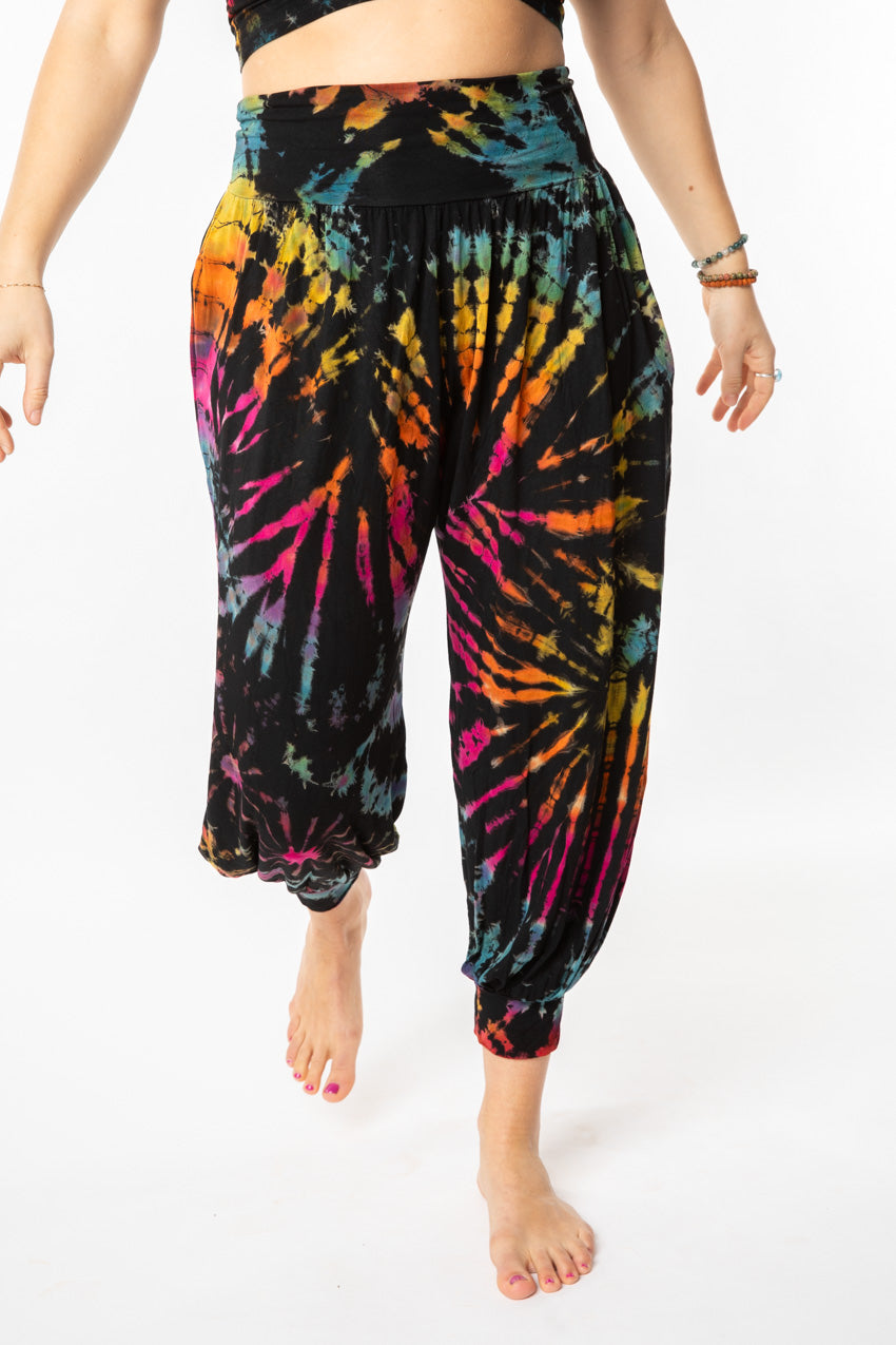 Sophie is wearing size S/M tie dye harem pants in black rainbow 