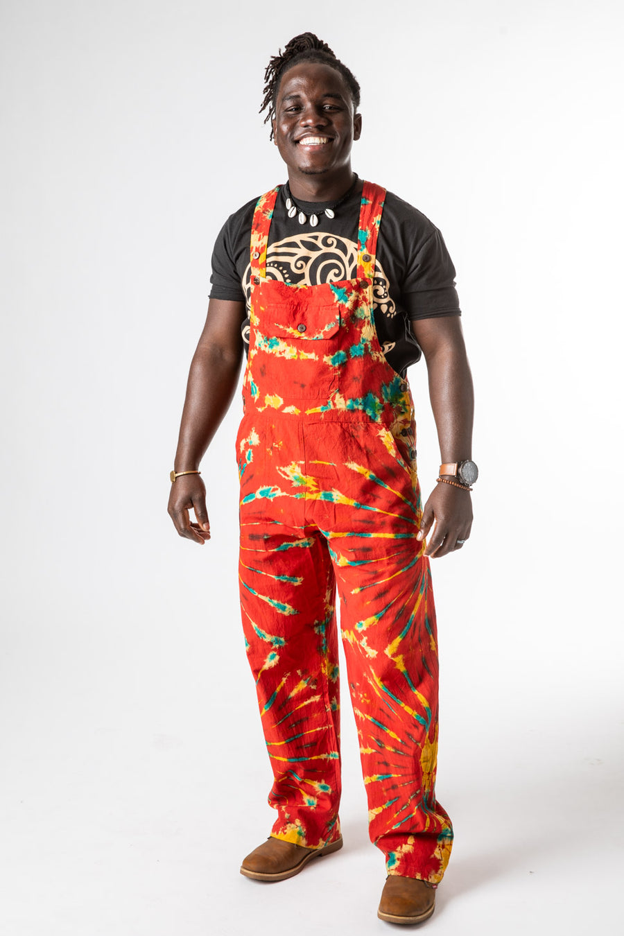 DJ is wearing size M tie dye overalls in red