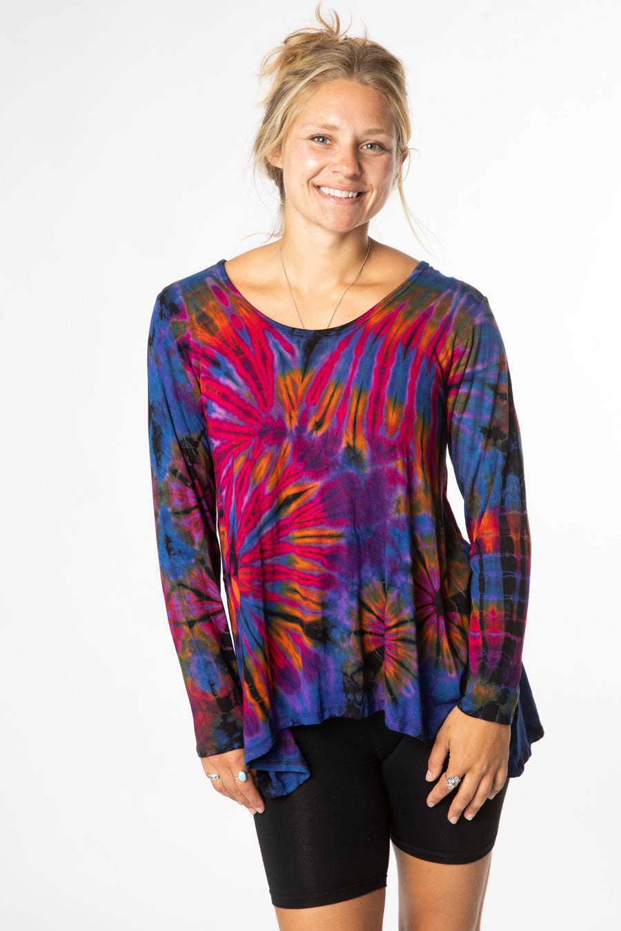 Sophie is wearing long sleeve tie dye top in purple