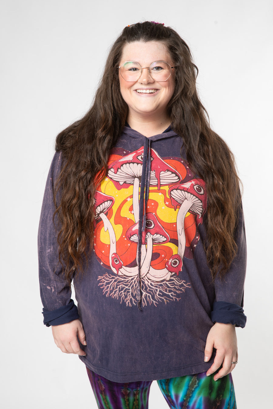 Desiree is wearing size L purple wonderland mushroom long sleeve shirt