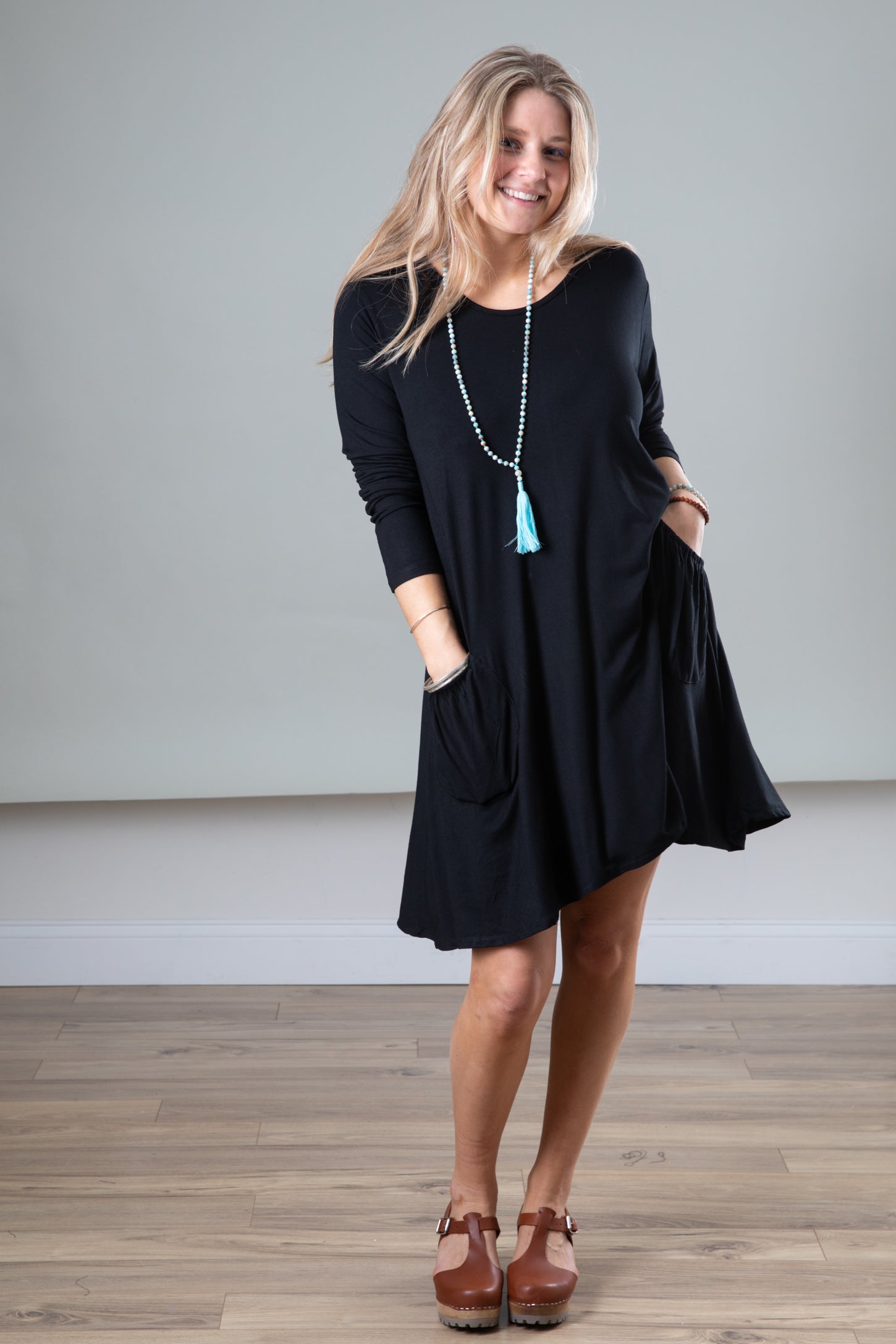 Black dress with 2024 pockets and sleeves